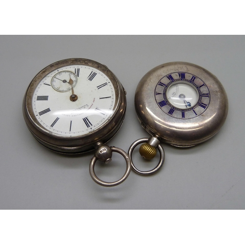 1043 - A silver cased top-wind half-hunter pocket watch, the dial marked Rossi, Norwich, and a silver cased... 