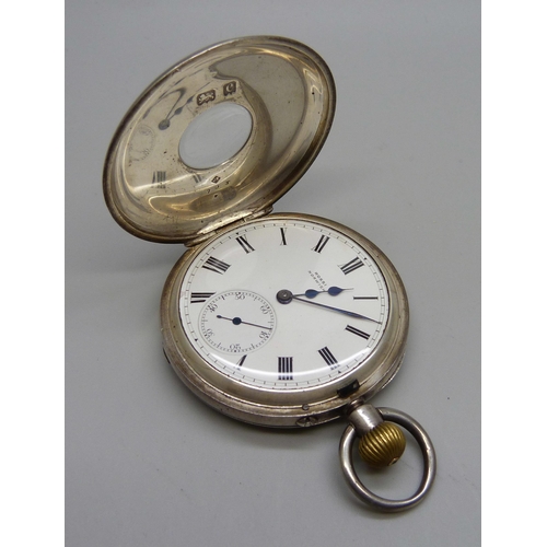 1043 - A silver cased top-wind half-hunter pocket watch, the dial marked Rossi, Norwich, and a silver cased... 