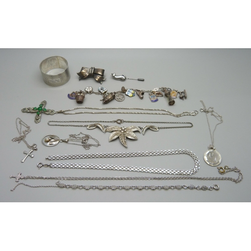 1044 - A silver charm bracelet, other silver jewellery, costume jewellery and a silver napkin ring, (90g of... 