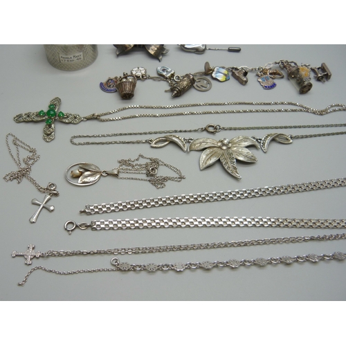 1044 - A silver charm bracelet, other silver jewellery, costume jewellery and a silver napkin ring, (90g of... 