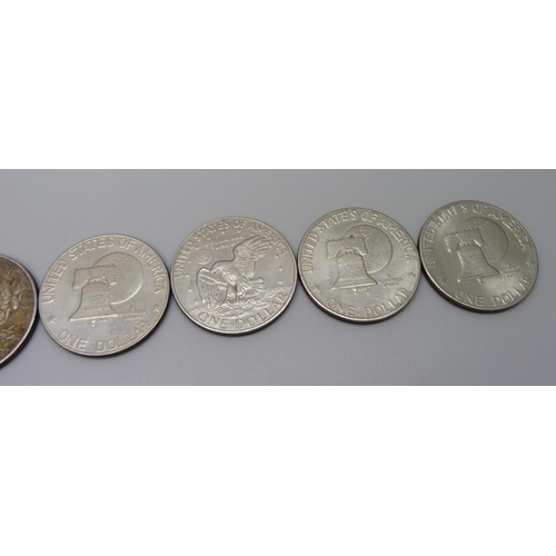 1047 - A 1922 silver dollar, a 1989 Maple Leaf 1oz silver coin, (pure), sealed mint pack, and four Eisenhow... 