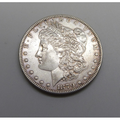 1058 - A 1879 silver US 'Morgan Dollar' one dollar coin