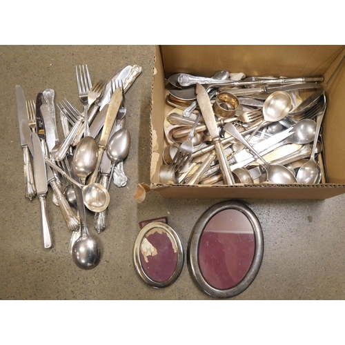 1069 - Plated flatware, two oval photograph frames, etc. **PLEASE NOTE THIS LOT IS NOT ELIGIBLE FOR IN-HOUS... 