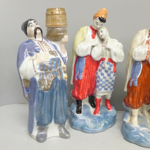 602 - Four USSR 1960s Soviet Folklore figures, 27cm (10½ inches tall)