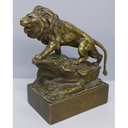 614 - An Eidsberg bronze model of a lion, height 14.5cm