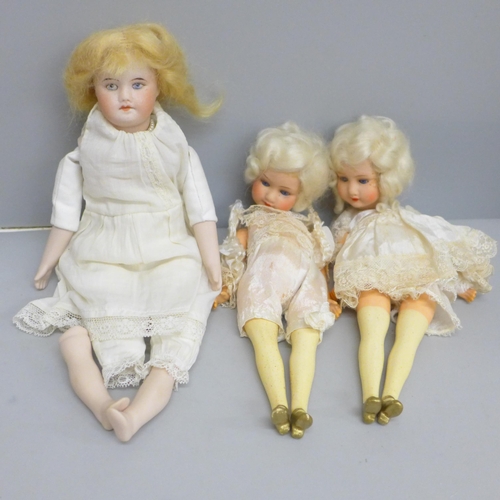 637 - A French SFBJ Paris bisque head doll and two Armand Marseille 390 bisque head dolls