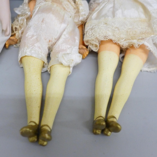 637 - A French SFBJ Paris bisque head doll and two Armand Marseille 390 bisque head dolls