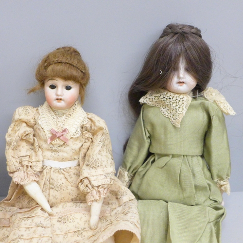 649 - Four bisque head dolls including German