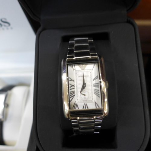 654 - A collection of wristwatches including Emporio Armani Art Deco style, Hugo Boss, Accurist, costume j... 