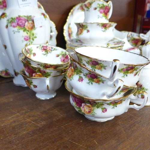 667 - A collection of Royal Albert Old Country Roses, six setting with soup bowls and plates and a Rose Ga... 