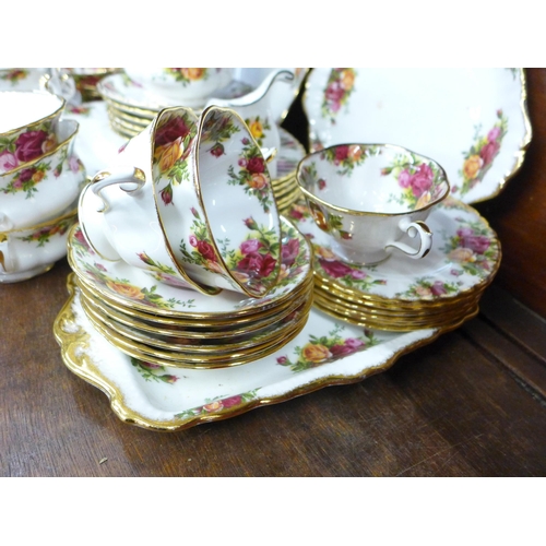 667 - A collection of Royal Albert Old Country Roses, six setting with soup bowls and plates and a Rose Ga... 