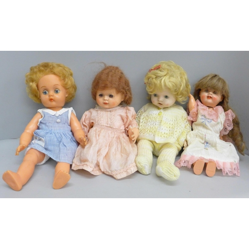 692 - Four 1950s dolls with sleep eyes