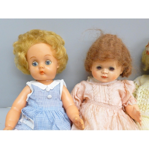 692 - Four 1950s dolls with sleep eyes