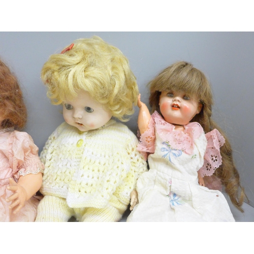 692 - Four 1950s dolls with sleep eyes