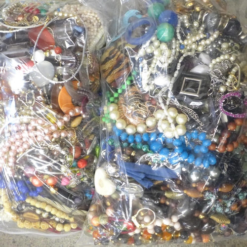 703 - Two bags of costume jewellery