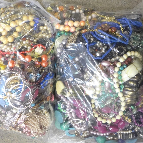 703 - Two bags of costume jewellery