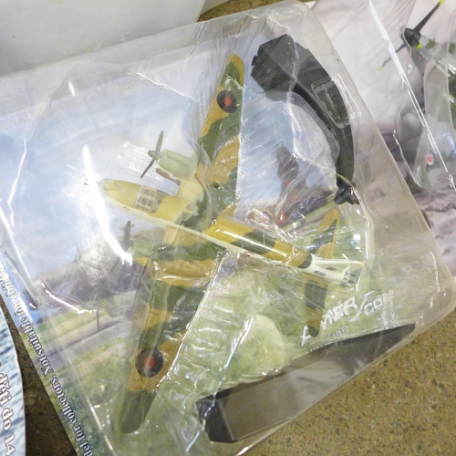 706 - Two boxes of packaged and loose military aircraft