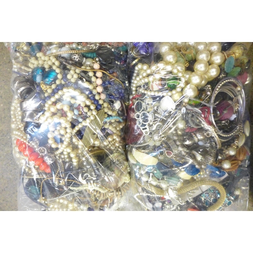 707 - Two bags of costume jewellery