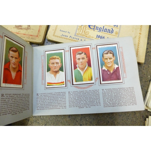 708 - A collection of loose cigarette cards including Ogdens, Gallagher, Wills, John Player's, five cigare... 