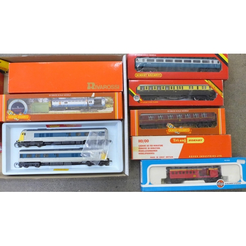 728 - Hornby OO gauge model rail, eleven wagons and carriages, all boxed except one Shell