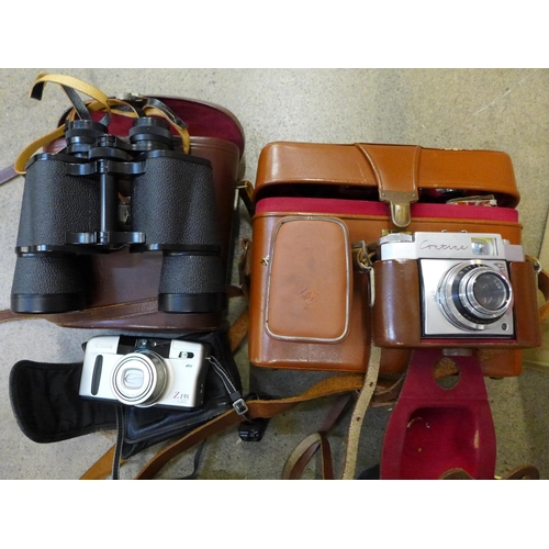 736 - A pair of Carl Zeiss Jena Jenoptem 10 x 50 binoculars, cased, a Canon Sureshot Z135 camera and a cam... 