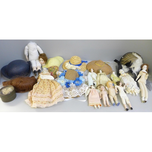 741 - A collection of 19th and early 20th century bisque head dolls together with doll accessories, hats a... 