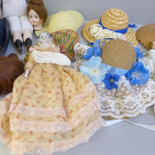 741 - A collection of 19th and early 20th century bisque head dolls together with doll accessories, hats a... 