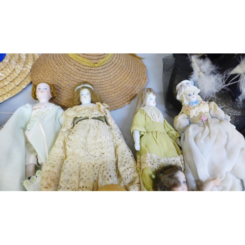 741 - A collection of 19th and early 20th century bisque head dolls together with doll accessories, hats a... 