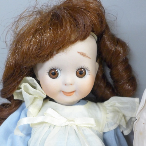 746 - A reproduction J.D. Kestner 221 bisque doll, signed Barbara Hamm 1986, a German bisque head sailor b... 