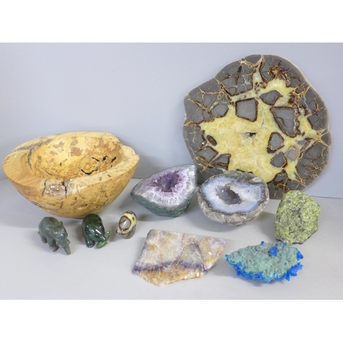 753 - A carved driftwood bowl, a collection of mineral samples, geodes, mineral slice and two small carved... 