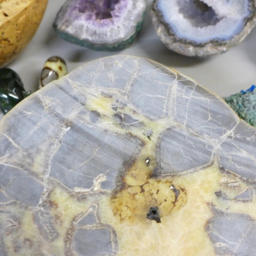 753 - A carved driftwood bowl, a collection of mineral samples, geodes, mineral slice and two small carved... 