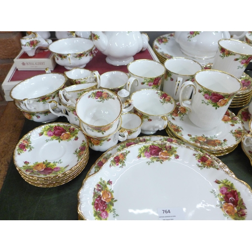 764 - A collection of Royal Albert Old Country Roses teawares, six setting with tea and coffee sets, soup ... 