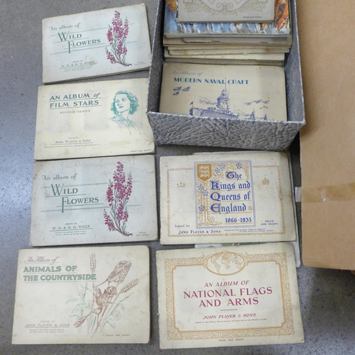 772 - A large quantity of cigarette cards and some tea cards