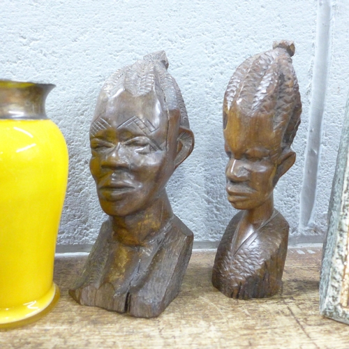 792 - Five carved African figures; four wooden, one stone