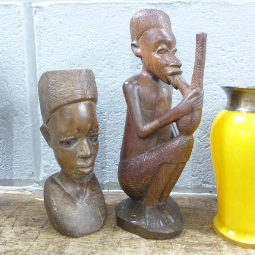 792 - Five carved African figures; four wooden, one stone