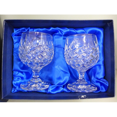 795 - A cased set of six Rockingham crystal whisky glasses and a pair of brandy glasses