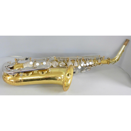 801 - A cased Vito saxophone