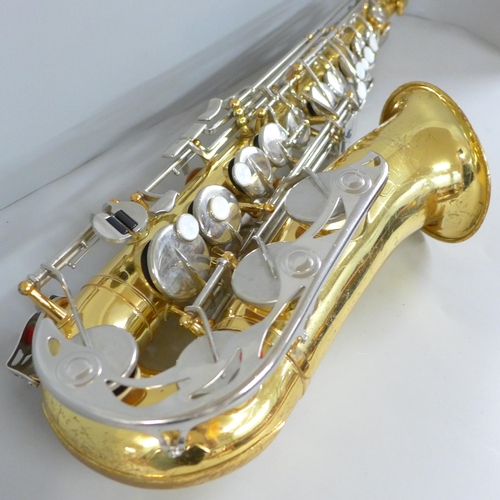 801 - A cased Vito saxophone