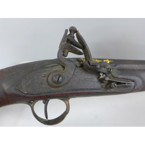 821 - A large flintlock pistol, marked London, a/f, 58cm **PLEASE NOTE THIS LOT IS NOT ELIGIBLE FOR IN-HOU... 