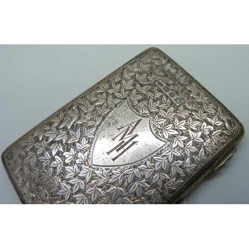 834 - A silver card case with engraved decoration and monogrammed cartouche, Birmingham 1899, 100g, 6.5cm ... 