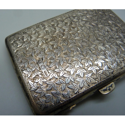 834 - A silver card case with engraved decoration and monogrammed cartouche, Birmingham 1899, 100g, 6.5cm ... 