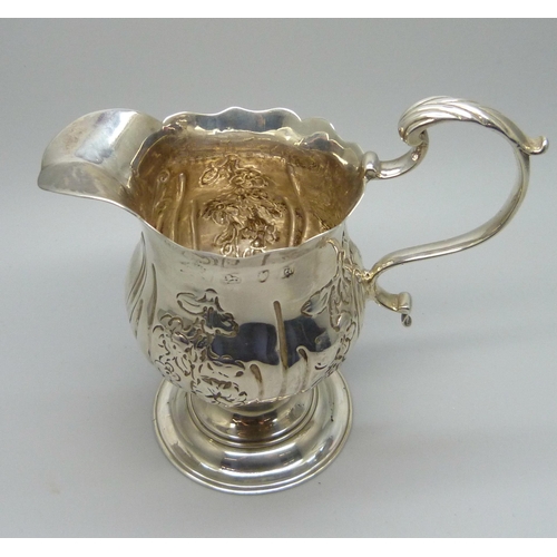 838 - A Georgian silver cream jug, London mark, 89g