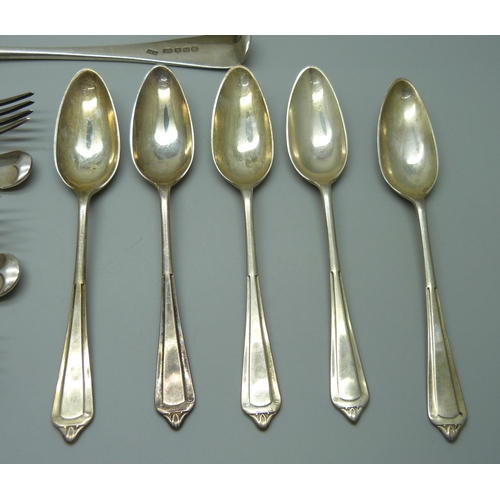 842 - A pair of 18th century silver spoons, London 1795, a set of five silver spoons and a set of five sil... 