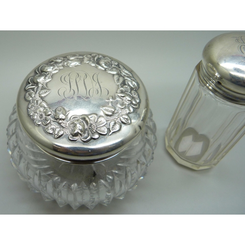 844 - Two silver topped glass dressing table pots, 34g of silver