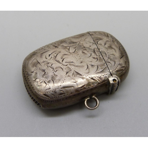 853 - A oval silver vesta case, Birmingham 1899