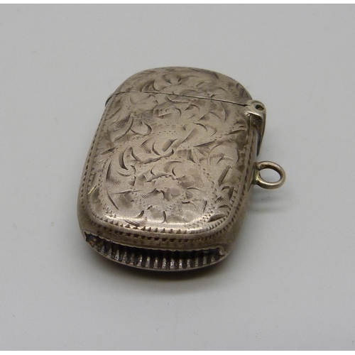 853 - A oval silver vesta case, Birmingham 1899