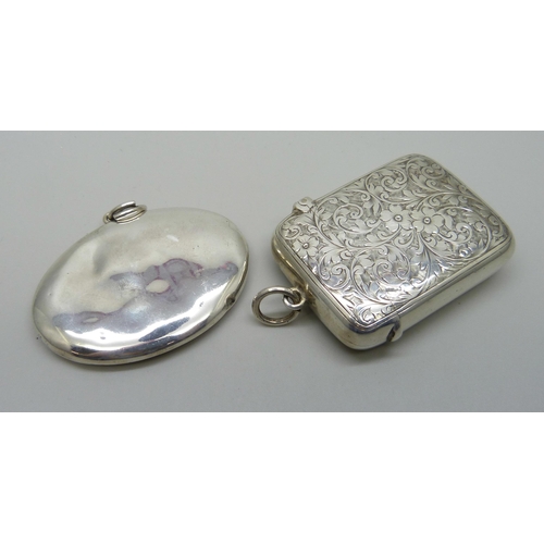 858 - A silver vesta case and a silver compact, 54g, compact a/f