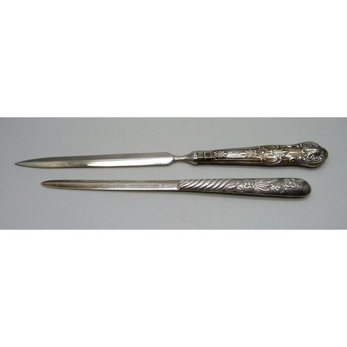 859 - A silver letter opener, London 1977 import mark, 19g, and a letter opener with silver covered handle