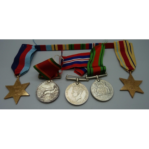 871 - A set of five WWII medals and miniatures to C277210 H.W. Martin