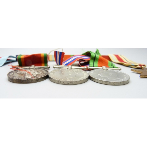 871 - A set of five WWII medals and miniatures to C277210 H.W. Martin